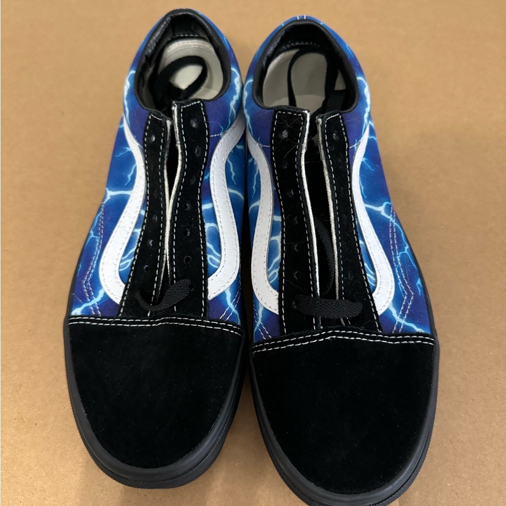 Black and blue lightning Vans. SIZE 7.5 women and 6.0 men